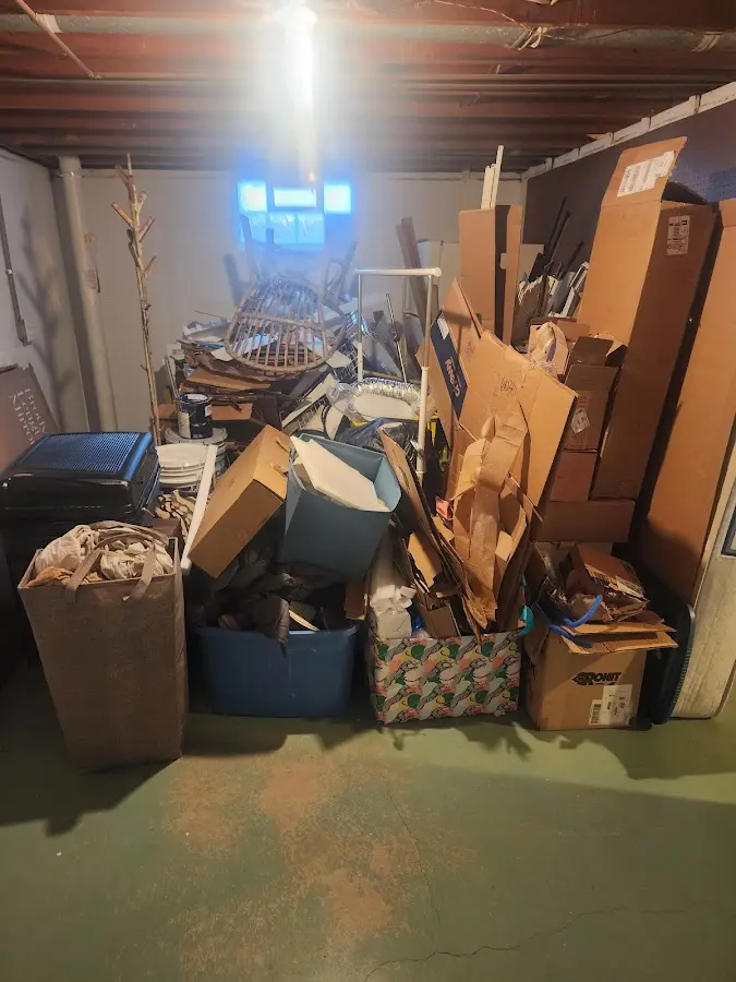 Roll-off dumpster container at job site for 8 Yard Dumpster Rental in Mayflower Village